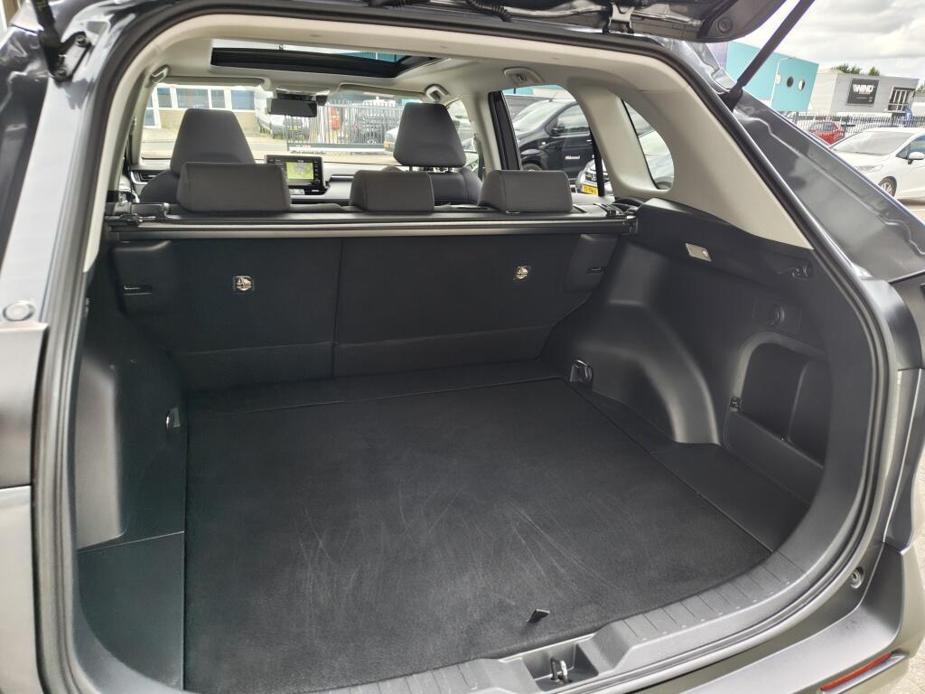 Toyota RAV4 2.5 Hybrid AWD Dynamic Plus | Trekhaak (1650kg trekgewicht) | Schuifkanteldak | Navi | Stoelverwarming - Image 34