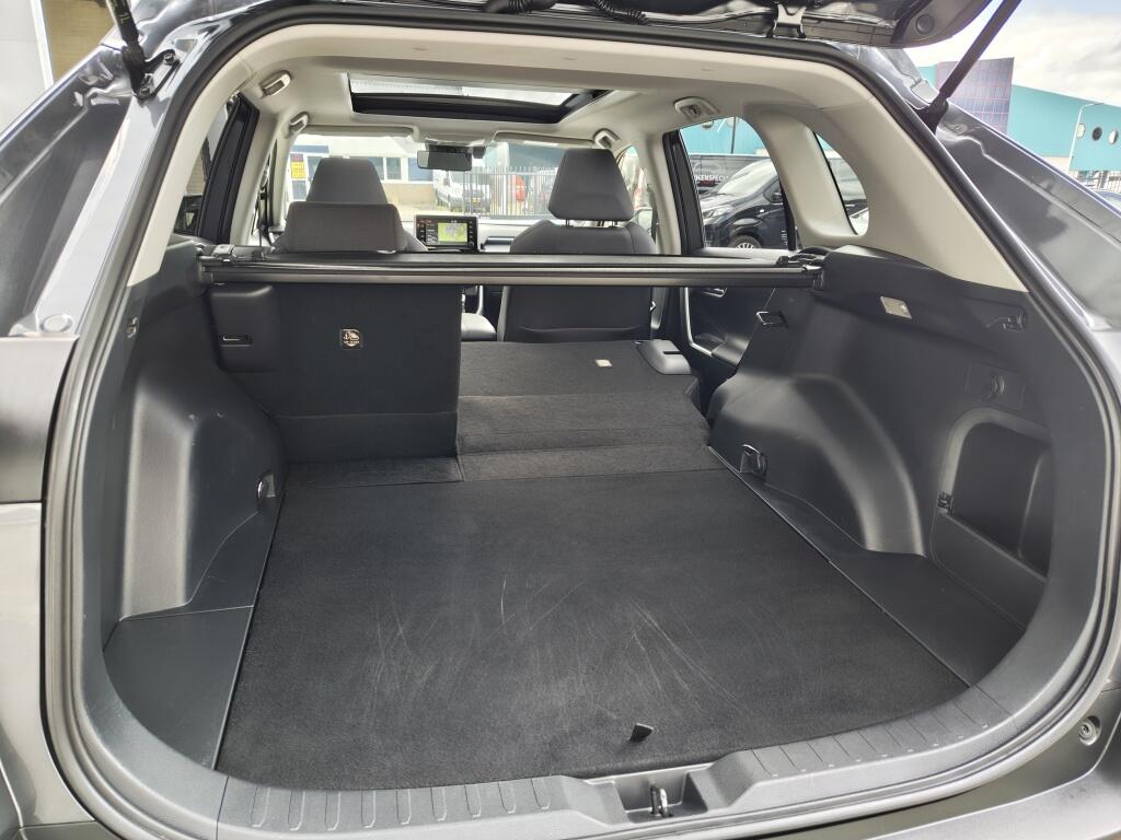 Toyota RAV4 2.5 Hybrid AWD Dynamic Plus | Trekhaak (1650kg trekgewicht) | Schuifkanteldak | Navi | Stoelverwarming - Image 35