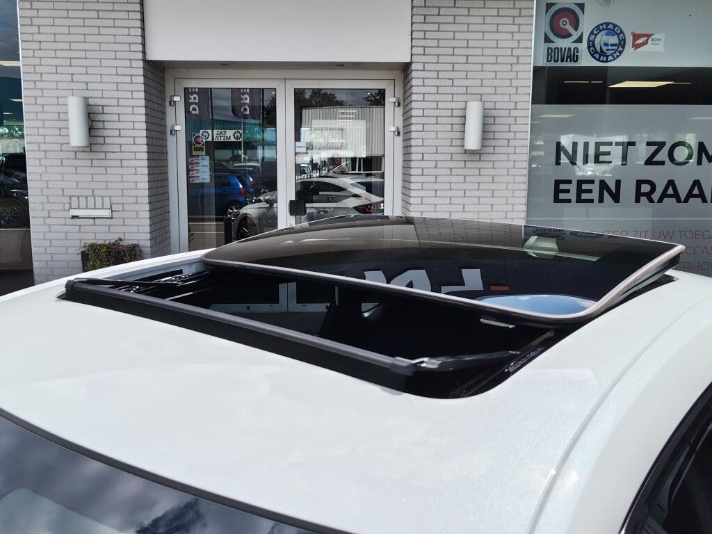 Honda Civic 2.0 e:HEV Advance | Bose | El. Schuifkanteldak | Navi | Stoelverwarming - Image 3
